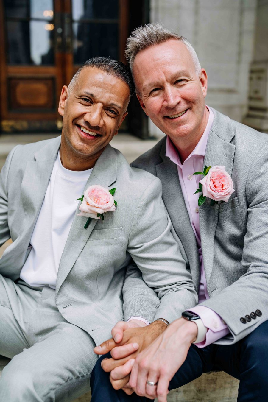 Candid portrait of two grooms, natural light